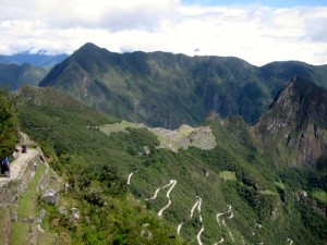 View of Machu Picchu from the Sun Gate. The switch back road is where the bus comes up from Aguas Calientes.